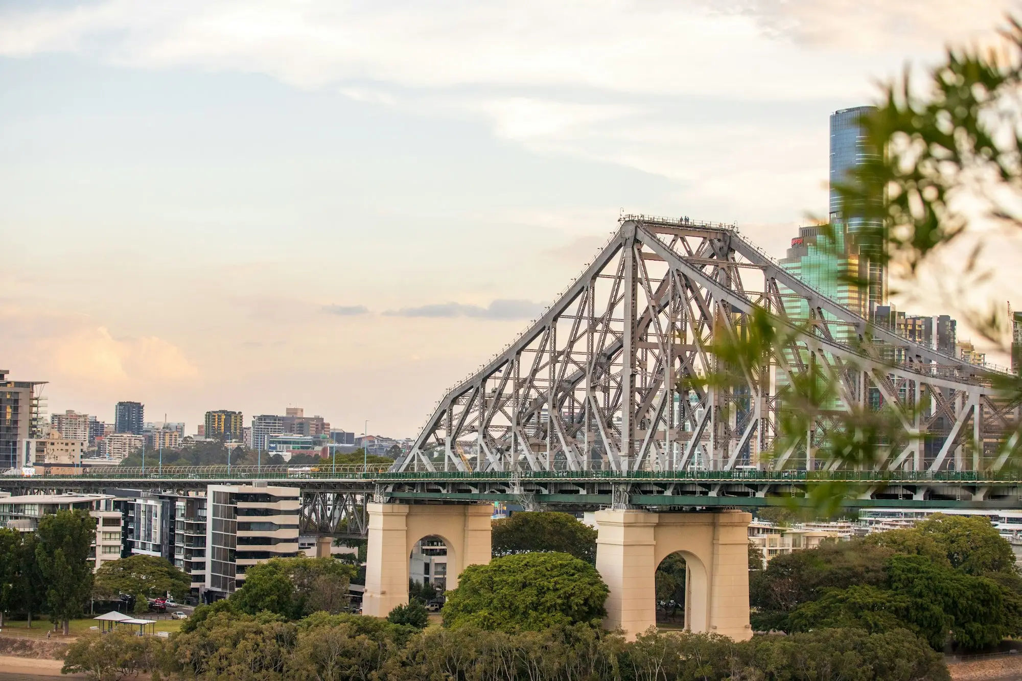The Story Bridge crossing the Brisbane River with the city skyline behind it