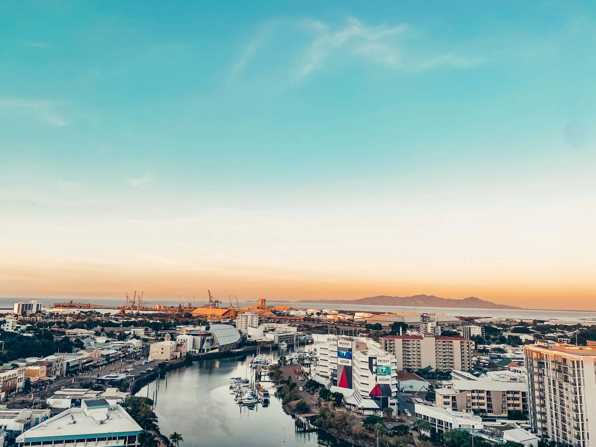Townsville city and Ross Creek seen from above at sunrise